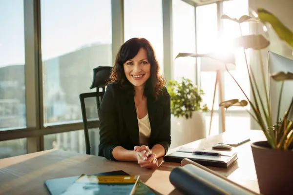 Young woman at her modern workplace