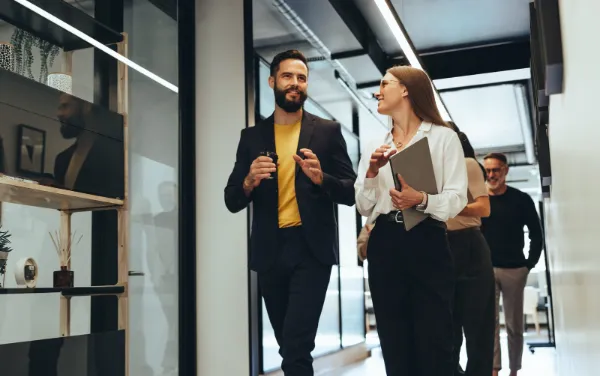 Young professionals having a discussion in an office